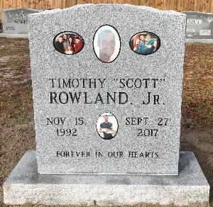 individual granite headstone with multiple porcelain portraits